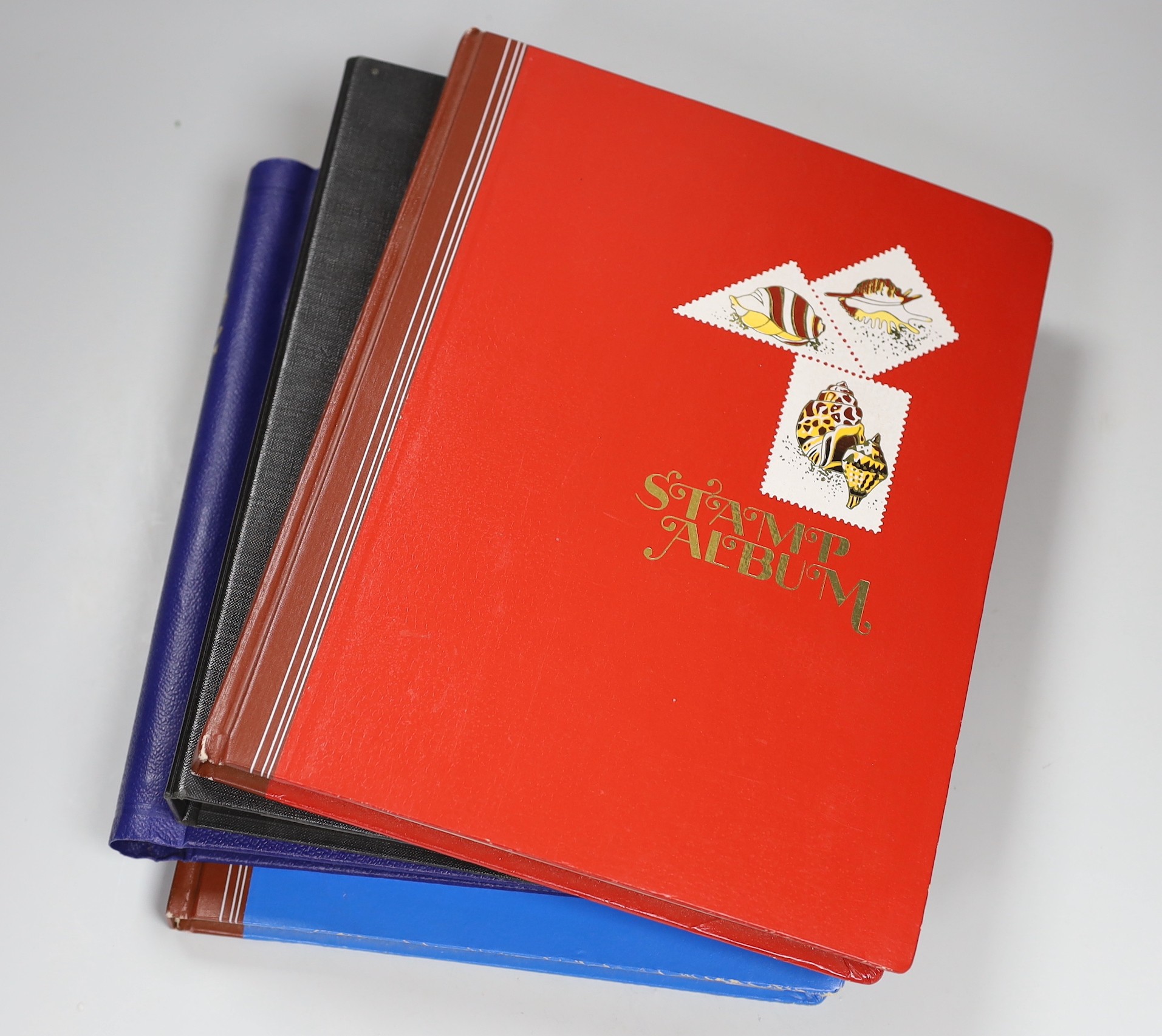 Four albums of World Stamps and a box of first day covers and mint unused stamps